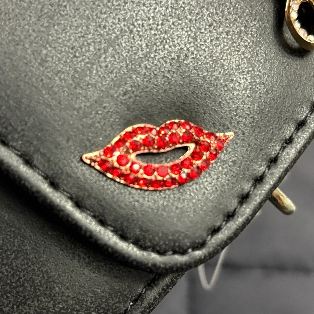 Crossbody bag is embellished with rhinestone motifs - NWT